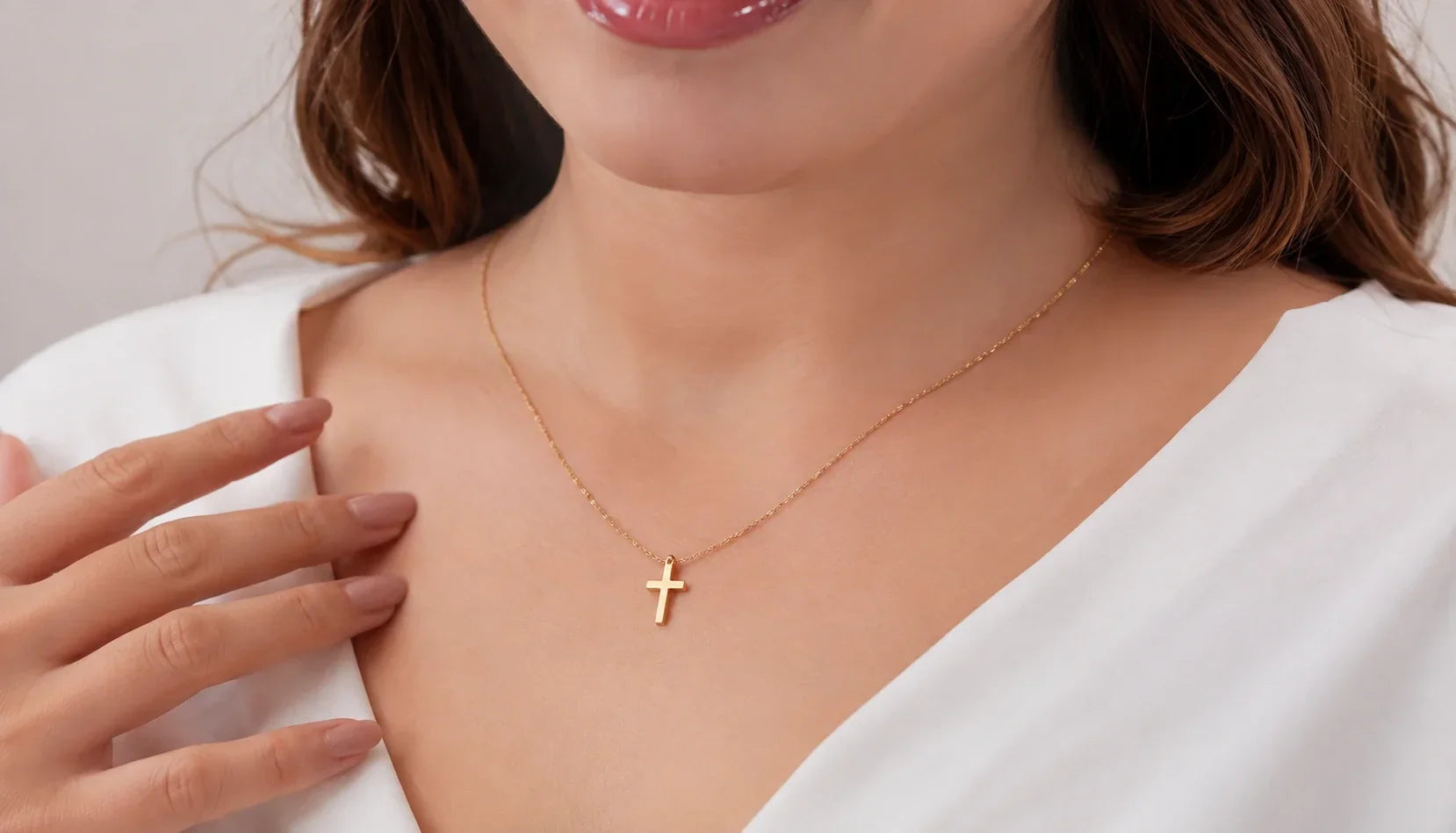What Does a Cross Necklace Mean? Meaning, History & Why People Wear One