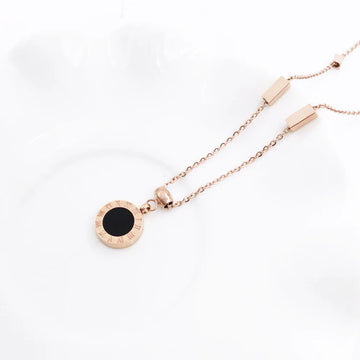 Rose gold stainless steel necklace with round Roman numeral pendant