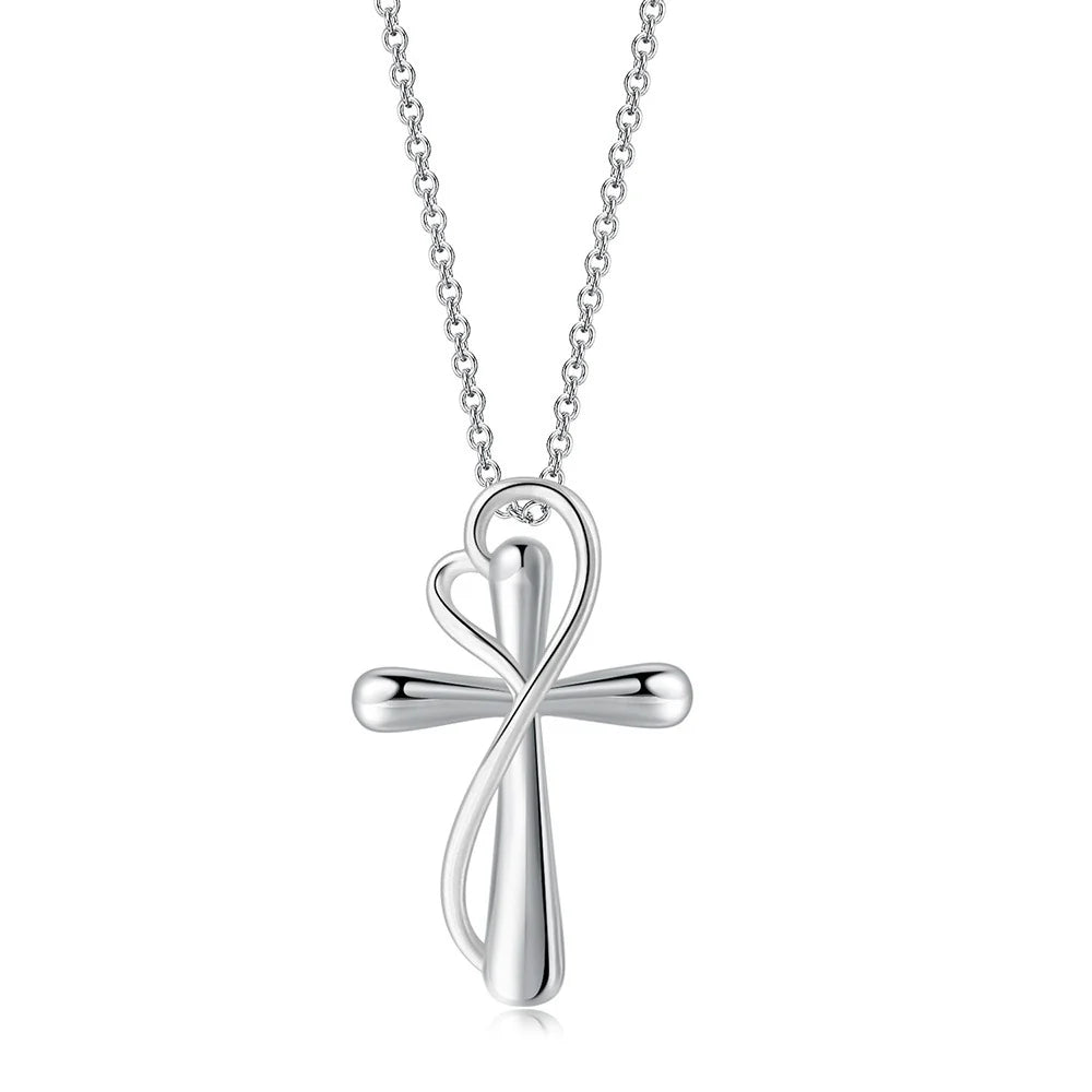 Two-tone gold plated brass cross necklace with heart infinity design