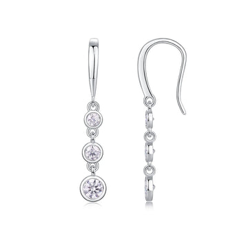 Sterling silver dangle earrings with three graduated moissanite stones