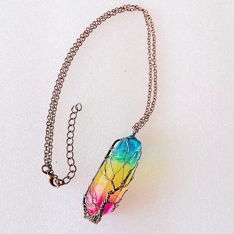 Necklace with a colorful feather-shaped pendant on a light background
